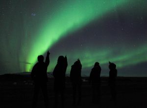 looking up at northern lights