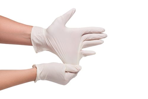 Stretching latex gloves