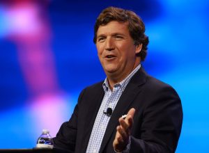 Tucker Carlson speaks at the Turning Point Action conference on July 15, 2023