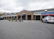 Mill Creek, WA USA - circa April 2022: Low angled view of the entrance to the Mill Creek United States Post Office building.