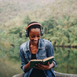 Woman,Listening,To,Music,In,Nature