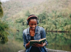 Woman,Listening,To,Music,In,Nature