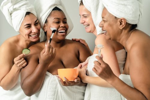 four female friends celebrating at a spa
