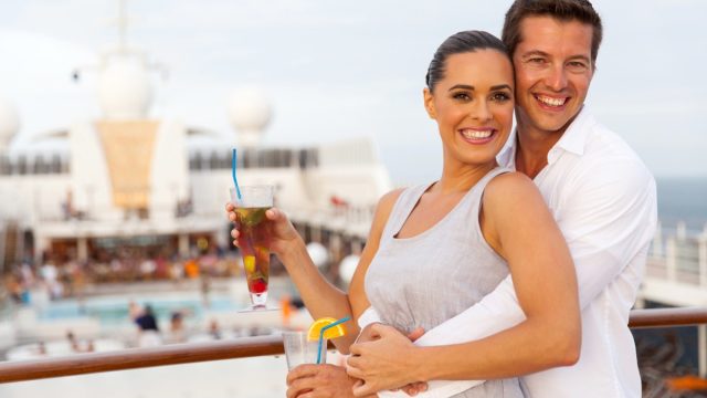happy caucasian couple having fun on cruise trip