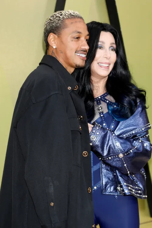 Alexander Edwards and Cher at the Versace FW23 Show in March 2023