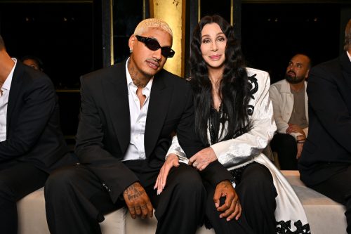 Alexander Edwards and Cher at a Balmain fashion show in September 2023