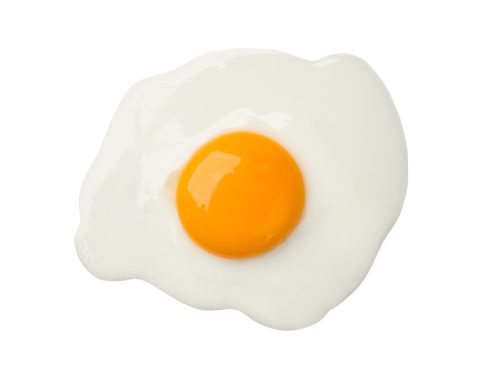 Fried egg isolated on white background