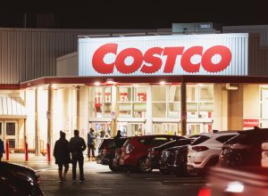 A Costco warehouse entrance at night
