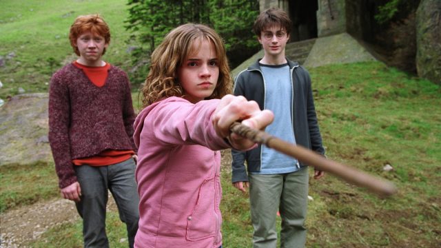 RUPERT GRINT as Ron Weasley, EMMA WATSON as Hermione Granger and DANIEL RADCLIFFE as Harry Potter