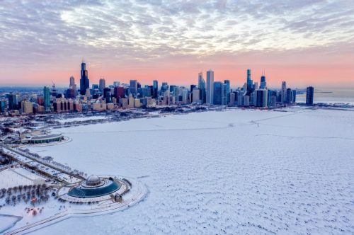 Chicago Cityscape in Winter during Polar Vortex - Frozen Lake Michigan - Aerial View