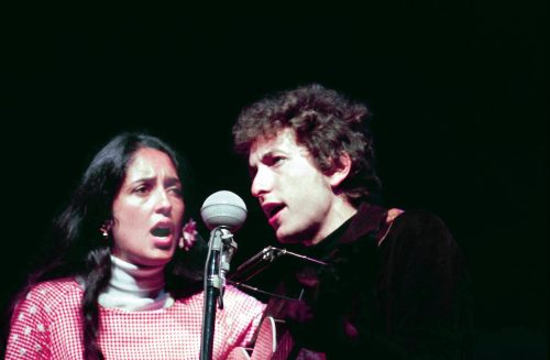 Joan Baez and Bob Dylan performing at the 1964 Newport Folk Festival