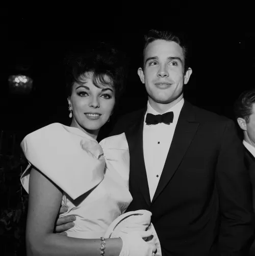 Joan Collins and Warren Beatty at a party in Los Angeles circa 1959