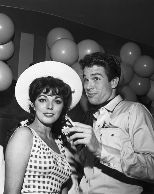 Joan Collins and Warren Beatty at a Hollywood event circa 1960s