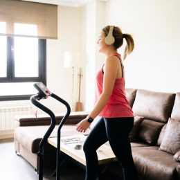woman happy working out at home