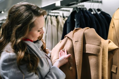 woman buying new coat