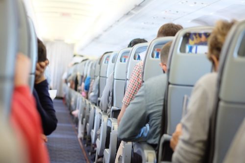 passengers seated on plane