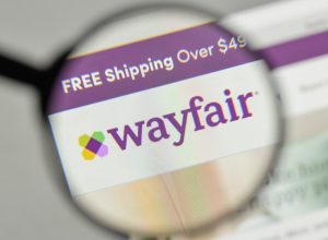 A close up of the Wayfair logo on the company's website