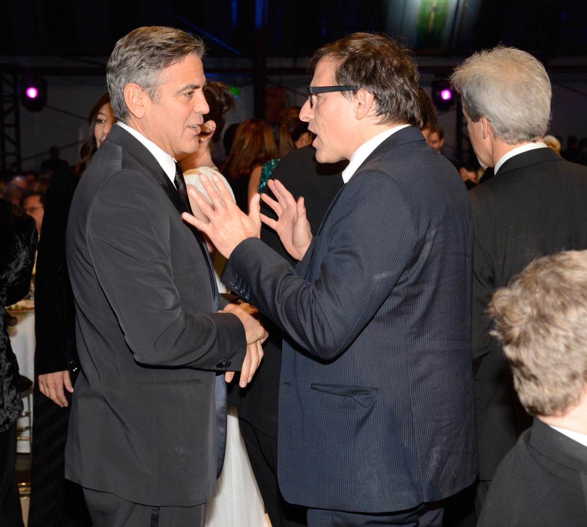 George Clooney and David O. Russell in 2013