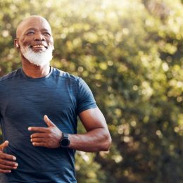 Healthy older man going for a run