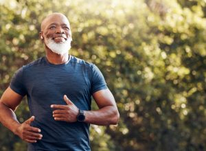 Healthy older man going for a run