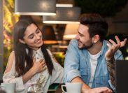Man and Woman Flirting at Cafe
