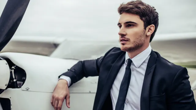 Young,Handsome,Businessman,Is,Standing,Near,Private,Plane.,Confident,And