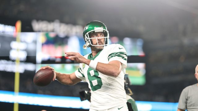 Aaron Rodgers #8 of the New York Jets passes as he warms up prior to a game against the Buffalo Bills at MetLife Stadium on September 11, 2023 in East Rutherford, New Jersey.