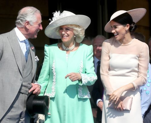 Prince Charles, Camilla Duchess of Cornwall, and Meghan Markle at Buckingham Palace in 2018