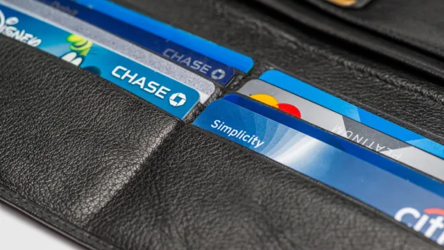 Close up of an open wallet with credit cards with Chase,Chase Disney,Citi Simplicity and Master card logos (for editorial use only)