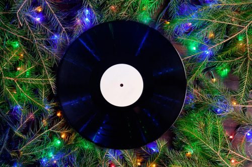 Vinyl gramophone record in christmas style for christmas playlist.