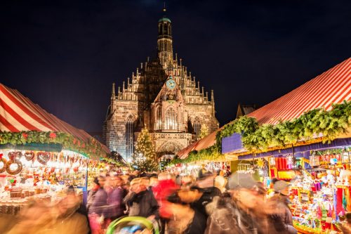 Huge crowd of people moving over Nuremberg´s world-famous christmas market