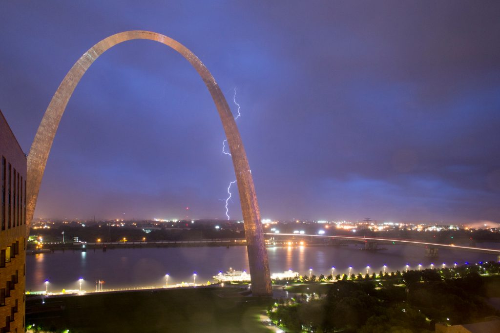 Thunder crackles over St Louis at night.