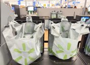 Close up of Walmart plastic bags at a Self Checkout register.