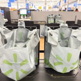 Close up of Walmart plastic bags at a Self Checkout register.