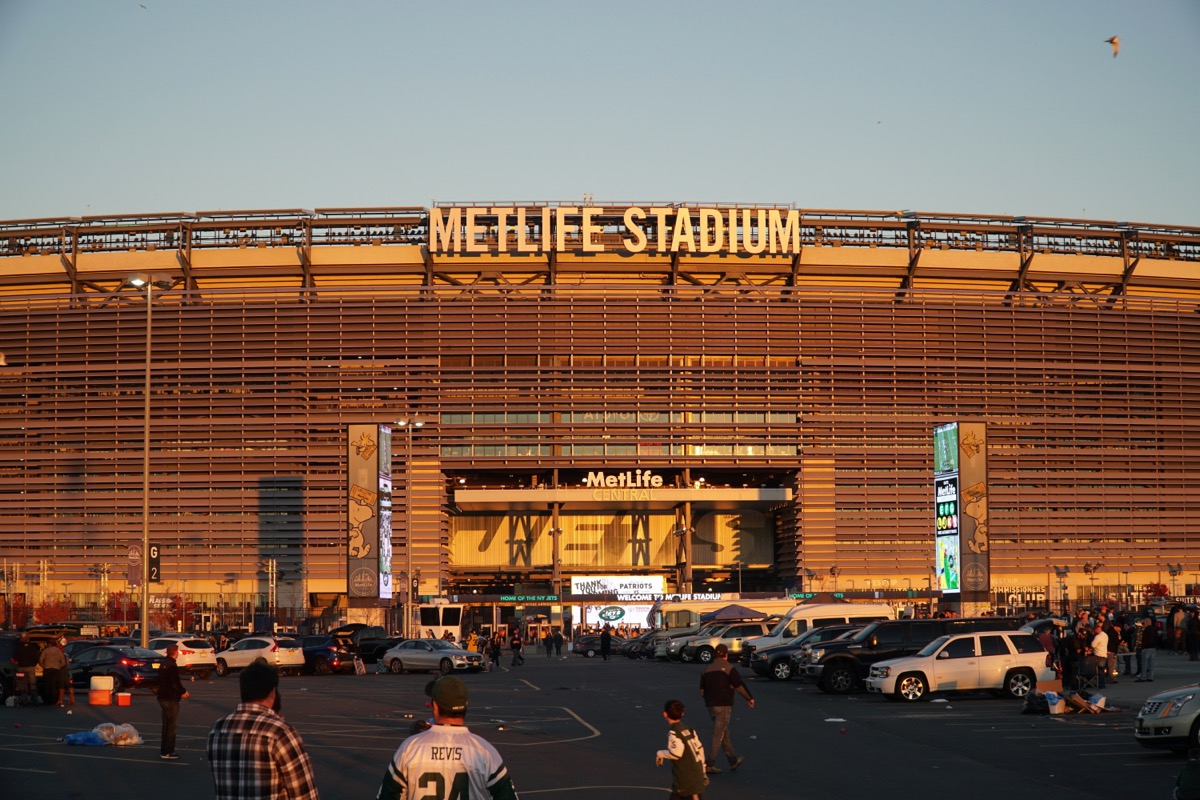 East Rutherford, New Jersey - November 2016: Metlife Stadium at sunset golden hour before New York Jets football game as fans tailgate before enter arena