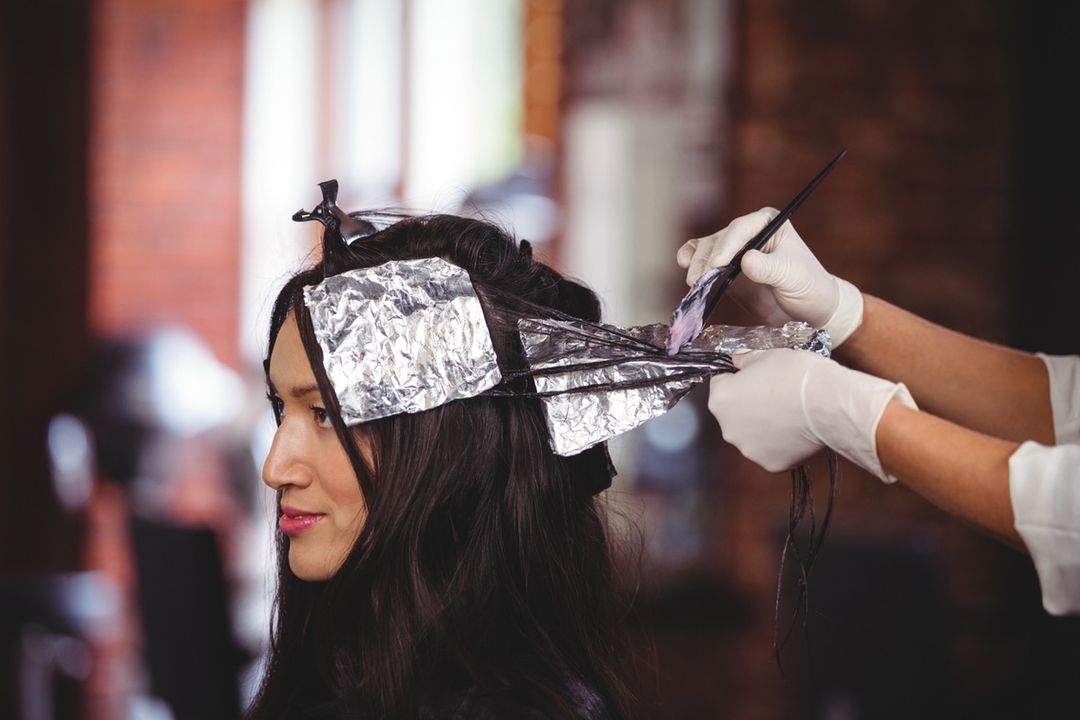 Woman Getting Highlights Done