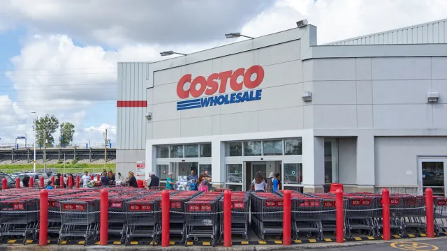 MONTREAL, CANADA - AUGUST 25, 2016 : Costco Wholesale store and logo. Costco Wholesale Corporation trading as Costco, is the largest American membership-only warehouse club
