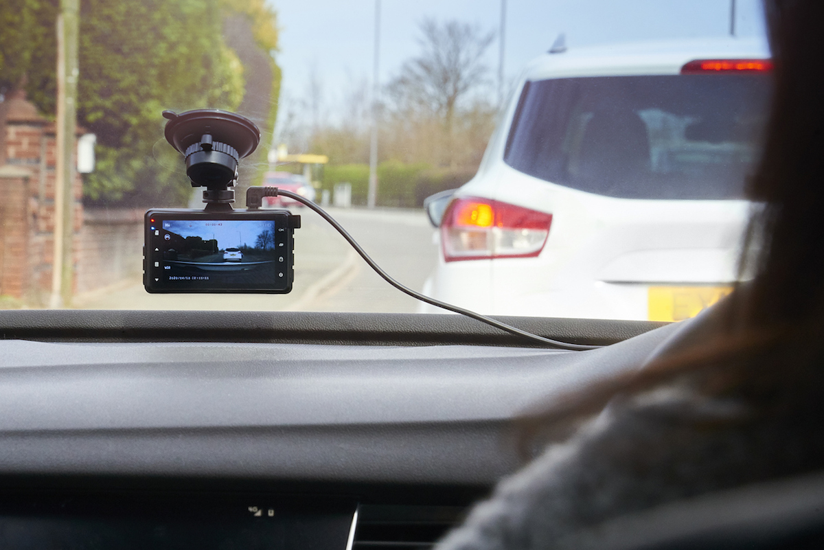 Dash cam in the windscreen of a car on it's daily commute.