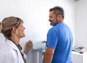 man talking to doctor about weight loss