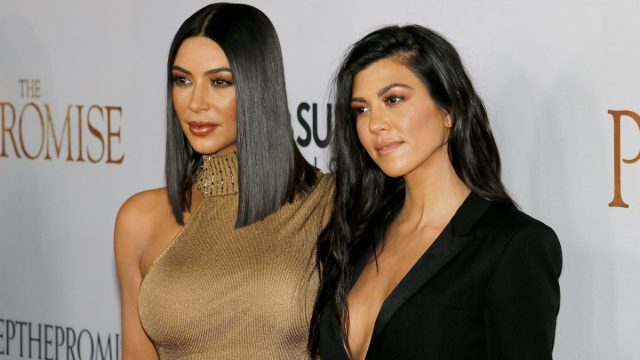 Kim and Kourtney Kardashian at the premiere of "The Promise" in 2017