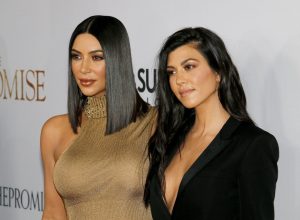 Kim and Kourtney Kardashian at the premiere of "The Promise" in 2017