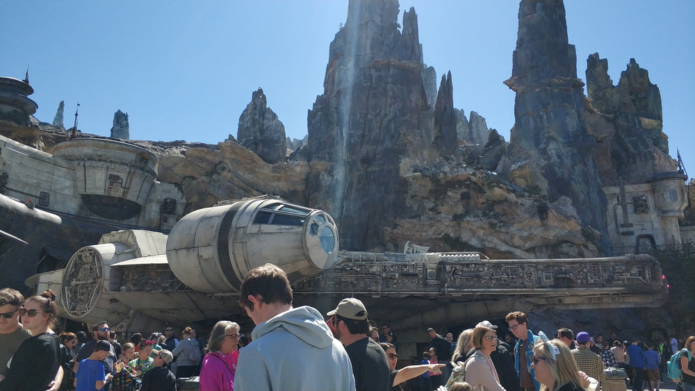 Crowds standing next to the Millennium Falcon at Disney Hollywood Studios