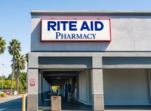 The storefront entrance of a Rite Aid pharmacy location