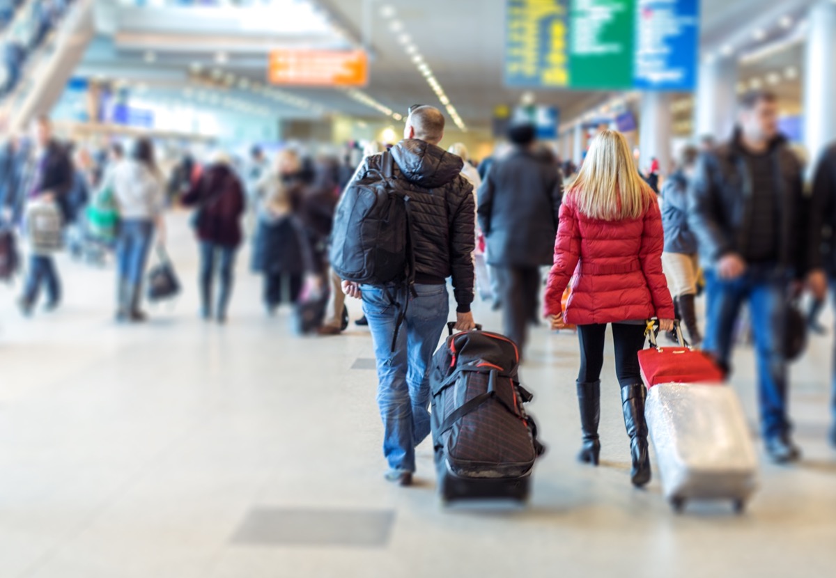 couple at airport during winter