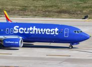 A Southwest plane taxiing on the runway
