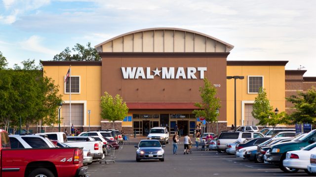 Citrus Heights, California, USA - May 20, 2011: View at a California Walmart storefront from its parking lot. Walmart is an American public multinational corporation that runs chains of large discount department stores and warehouse stores.