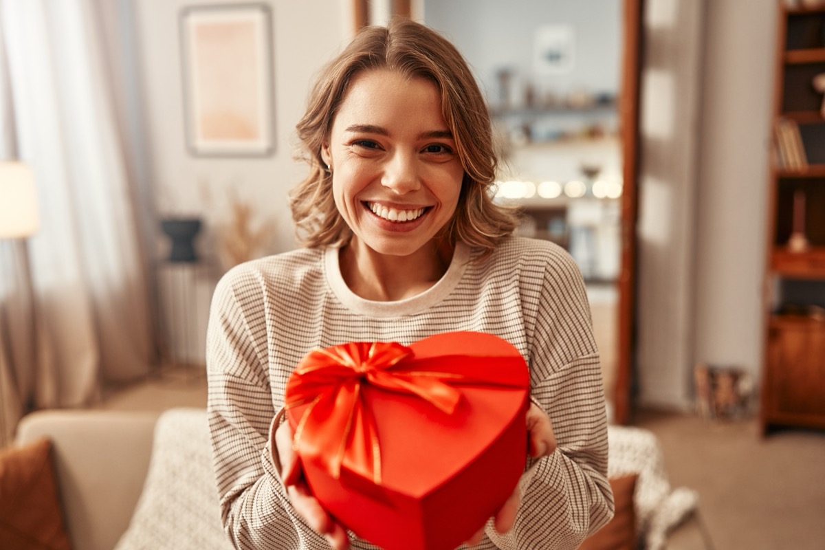 Girl Holding Hear Shaped Box