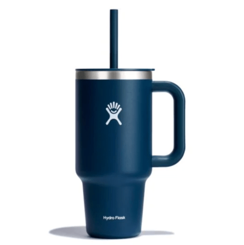 A Hydro Flask navy blue tumbler against a white background