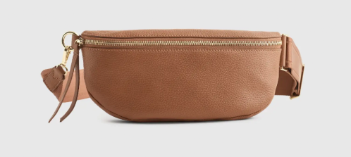 Italian Pebbled Leather Sling Bag in Cognac from Quince against a white background