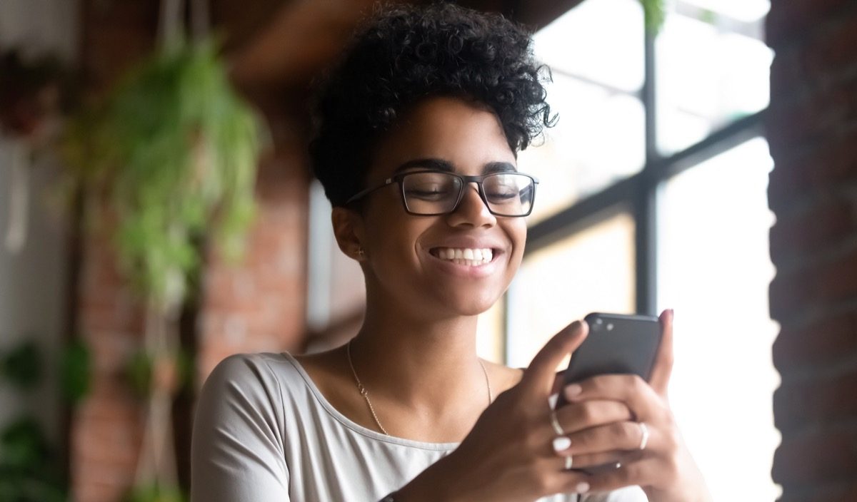 woman happy to receive a good morning text